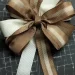 A DIY wreath making tutorial showcasing an everyday bow and crafting techniques.