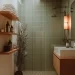 Stunning mid century modern bathroom design showcasing tiny powder room ideas.