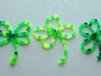 Colorful beaded shamrocks made from pipe cleaners for festive decoration